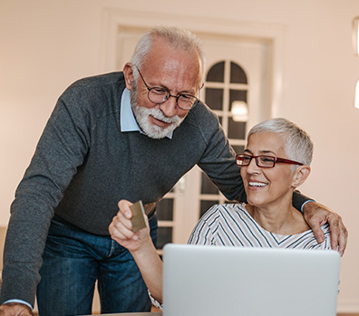 Retiree couple checking NexteraEnergy Resources