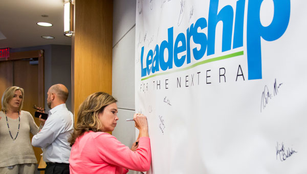 NextEra Energy Leadership student writing on a whiteboard