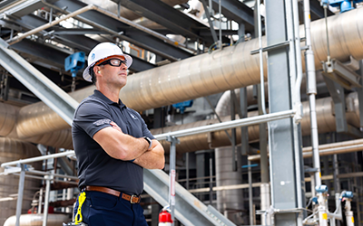 NextEra employee by a natural gas facility